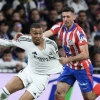 Real và Atletico chia điểm trong trận derby Madrid. (Nguồn: AFP)