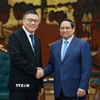 Thủ tướng Phạm Minh Chính tiếp ông Hồng Thiên Chúc, Chủ tịch Tập đoàn Texhong (Trung Quốc). (Ảnh: Dương Giang/TTXVN)