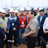 Thủ tướng Phạm Minh Chính giao nhiệm vụ cho các đơn vị thi công khu tái định cư Dự án Cảng hàng không quốc tế Gia Bình. (Ảnh: Dương Giang/TTXVN)