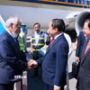 Bộ trưởng Bộ Khoa học và Công nghệ Vũ Hải Quân đón Thủ tướng Timor Leste Kay Rala Xanana Gusmão tại sân bay quốc tế Nội Bài (Hà Nội). (Ảnh: Phạm Kiên/TTXVN)
