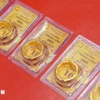 Công ty TNHH Bảo tín Minh Châu niêm yết giá vàng nhẫn ở mức 156,5-159,5 triệu đồng/lượng (mua vào-bán ra). (Ảnh: TTXVN)