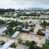 Khu vực Phong Châu phường Nam Nha Trang (Khánh Hòa) ngập sâu trong nước lũ. (Ảnh: Nguyễn Thành/TTXVN)