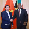 Thủ tướng Phạm Minh Chính hội kiến Tổng thống Cộng hòa Nam Phi Matamela Cyril Ramaphosa. (Ảnh: Dương Giang/TTXVN)