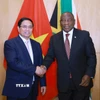 Thủ tướng Phạm Minh Chính hội kiến Tổng thống Cộng hòa Nam Phi, Chủ tịch G20 năm 2025, Matamela Cyril Ramaphosa. (Ảnh: Dương Giang/TTXVN)