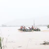 Mưa lũ chia cắt nhiều khu vực tại tỉnh Khánh Hòa. (Ảnh: Xuân Triệu/TTXVN)