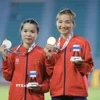 Nguyễn Thị Oanh lần thứ 5 giành HCV chạy 5000m nữ tại SEA Games, Lê Thị Tuyết giành HCB cùng nội dung. (Ảnh: Minh Quyết/TTXVN)