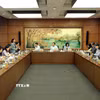 Đoàn đại biểu Quốc hội thành phố Hà Nội thảo luận tại tổ. (Ảnh: An Đăng/TTXVN)