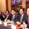 Bí Thư Nghiêm Xuân Thành (thứ 3 từ phải sang) tham dự Diễn đàn Kinh tế Việt Nam-Hàn Quốc. (Ảnh: Khánh Vân/TTXVN)