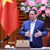 Thủ tướng Phạm Minh Chính chủ trì họp về dự án quy hoạch xây dựng cảnh quan sông Hồng. (Ảnh: Dương Giang/TTXVN)