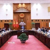 Thủ tướng Phạm Minh Chính chủ trì họp về dự án quy hoạch xây dựng cảnh quan sông Hồng. (Ảnh: Dương Giang/TTXVN)