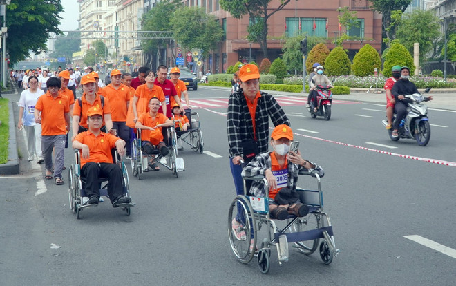 Giải chạy có sự tham gia của người khuyết tật trên địa bàn thành phố Hồ Chí Minh. (Ảnh: TTXVN) z6707157990237-23e0380462e36c1408b3071283b11a84.jpg