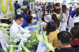 Hội chợ Du lịch quốc tế VITM Hà Nội luôn thu hút đông đảo sự quan tâm của công chúng. (Ảnh minh họa: Mai Mai/Vietnam+)