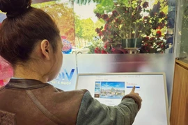 Vietravel đẩy mạnh ứng dụng số hóa vào trải nghiệm đặt tour của khách hàng. (Ảnh: CTV/Vietnam+)