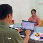 Triệu Thị Tâm tại cơ quan công an. (Ảnh: TTXVN phát)