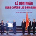 Tổng Bí thư Tô Lâm trao Huân chương Lao động hạng Nhất tặng Báo Nhân Dân. (Ảnh: Thống Nhất/TTXVN)