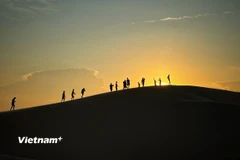 Đồi cát ở Mũi Né khi hoàng hôn. (Ảnh: Mai Mai/Vietnam+)
