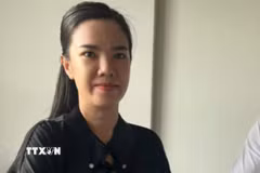 Bị can Nguyễn Phạm Như Huỳnh bị bắt giữ sau 4 năm bỏ trốn. (Ảnh: TTXVN phát)