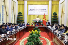 Văn phòng Chủ tịch nước tổ chức họp báo công bố Lệnh của Chủ tịch nước công bố 13 luật. (Ảnh: Minh Đức/TTXVN)