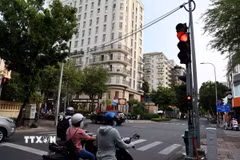 Đèn tín hiệu giao thông không đếm thời gian ở giao lộ Nguyễn Đình Chiểu-Bà Huyện Thanh Quan, quận 3, Thành phố Hồ Chí Minh. (Ảnh: Hồng Đạt/TTXVN)