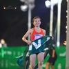 Nguyễn Thị Oanh có lần thứ 4 liên tiếp giành chức vô địch cự ly 21km Giải Bán marathon Quốc tế Việt Nam. (Ảnh: VIHM)