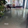 Mưa lớn kết hợp triều cường gây ngập ở tỉnh Bình Dương. (Ảnh: TTXVN phát)