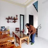 Ngôi nhà mới của bà Vũ Thị Nữ, thân nhân liệt sỹ ở xã Hiệp Hòa giúp bà yên tâm để thờ phụng. (Ảnh: Thanh Vân/TTXVN)