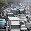 Tình trạng ùn tắc cục bộ xảy ra tại tuyến đường Giải Phóng hướng ra khỏi Thủ đô. (Ảnh: Phạm Kiên/TTXVN)