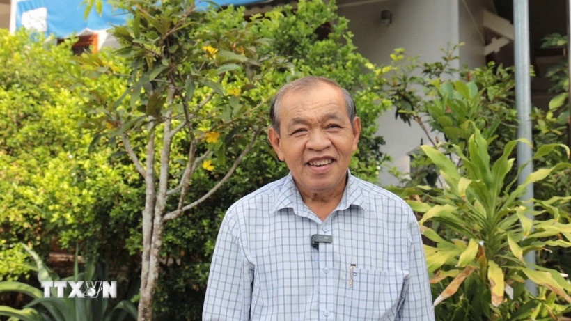 Ông Nguyễn Thành Chinh (Chủ tịch Hội Người cao tuổi, Ban Chấp hành Hội Nông dân xã Tân Hội, tỉnh Tây Ninh) đặt niềm tin vào sự lãnh đạo của Đảng. (Ảnh: Thanh Tân/TTXVN)