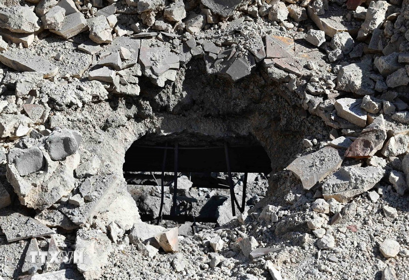 Hiện trường cuộc không kích của Israel xuống Damascus, Syria tháng 3/2025. (Ảnh: THX/TTXVN)