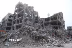 Tòa nhà bị phá hủy sau vụ không kích xuống Tehran, Iran. (Ảnh: THX/TTXVN)