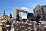 Công tác tìm kiếm các nạn nhân mất tích được triển khai tích cực. (Ảnh: Hoàng Vũ/TTXVN phát)