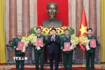 Chủ tịch nước Lương Cường trao Quyết định thăng quân hàm từ Trung tướng lên Thượng tướng đối với các đồng chí Ủy viên Trung ương Đảng, Uỷ viên Quân uỷ Trung ương: Nguyễn Hồng Thái, Thứ trưởng Bộ Quốc phòng; Nguyễn Văn Hiền, Thứ trưởng Bộ Quốc phòng; Nguyễn Trường Thắng, Thứ trưởng Bộ Quốc phòng; Nguyễn Quang Ngọc, Phó Tổng Tham mưu trưởng Quân đội nhân dân Việt Nam. (Ảnh: Lâm Khánh/TTXVN)