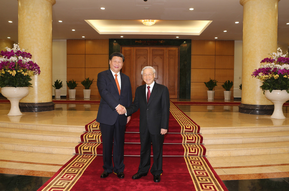 Tổng Bí thư Nguyễn Phú Trọng đón Tổng Bí thư, Chủ tịch nước Trung Quốc Tập Cận Bình. (Ảnh: Trí Dũng/TTXVN)