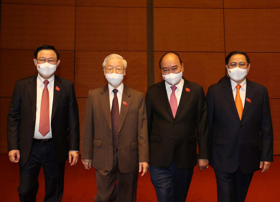 Tổng Bí thư Nguyễn Phú Trọng, Chủ tịch nước Nguyễn Xuân Phúc, Thủ tướng Chính phủ Phạm Minh Chính, Chủ tịch Quốc hội Vương Đình Huệ dự bế mạc Kỳ họp thứ hai, Quốc hội khóa XV. (Ảnh: Trí Dũng/TTXVN)