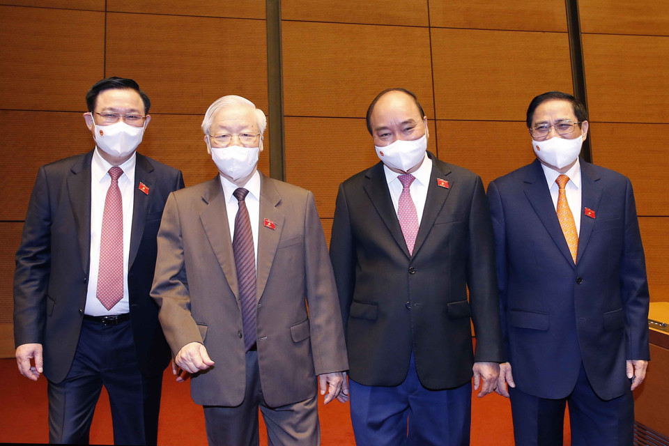 Tổng Bí thư Nguyễn Phú Trọng, Chủ tịch nước Nguyễn Xuân Phúc, Thủ tướng Phạm Minh Chính, Chủ tịch Quốc hội Vương Đình Huệ dự phiên họp. (Ảnh: Doãn Tấn/TTXVN)