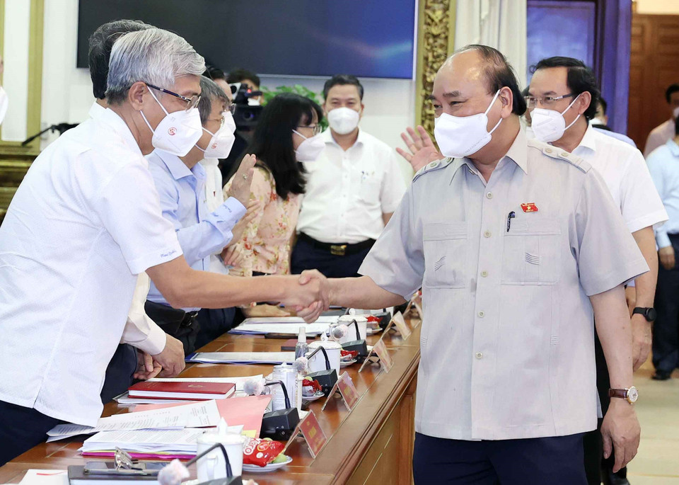 Chủ tịch nước Nguyễn Xuân Phúc với các đại biểu dự hội nghị. (Ảnh: Thống Nhất/TTXVN)