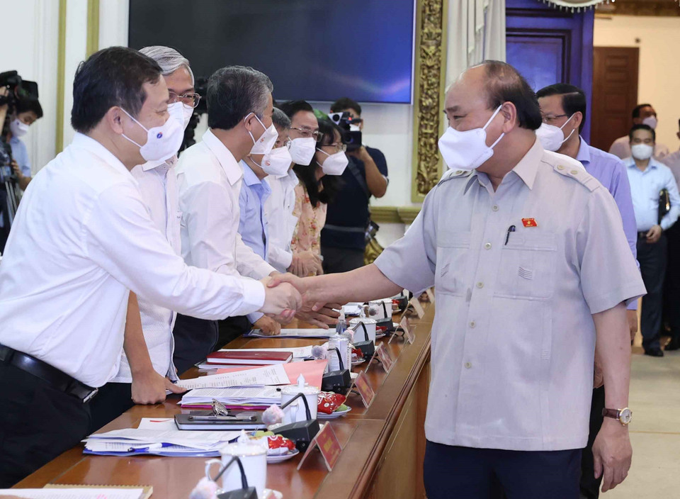 Chủ tịch nước Nguyễn Xuân Phúc với các đại biểu dự hội nghị. (Ảnh: Thống Nhất/TTXVN)