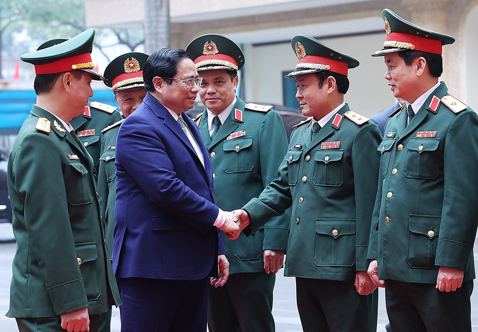 Thủ tướng Phạm Minh Chính thăm, chúc Tết cán bộ, giảng viên, sinh viên Trường Đại học Văn hóa-Nghệ thuật Quân đội. (Ảnh: Dương Giang/TTXVN)