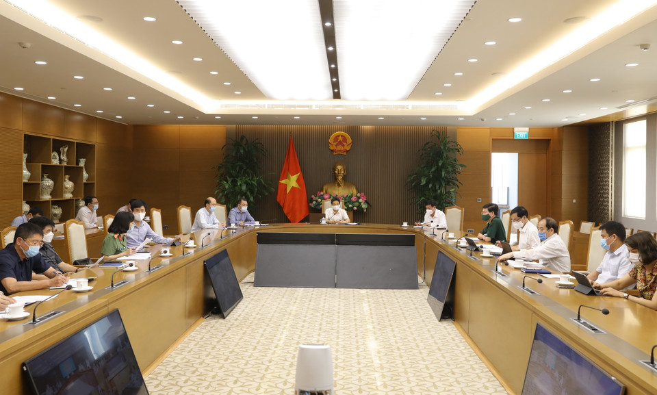 Phó Thủ tướng Vũ Đức Đam chủ trì cuộc họp. (Ảnh: Văn Điệp/TTXVN)