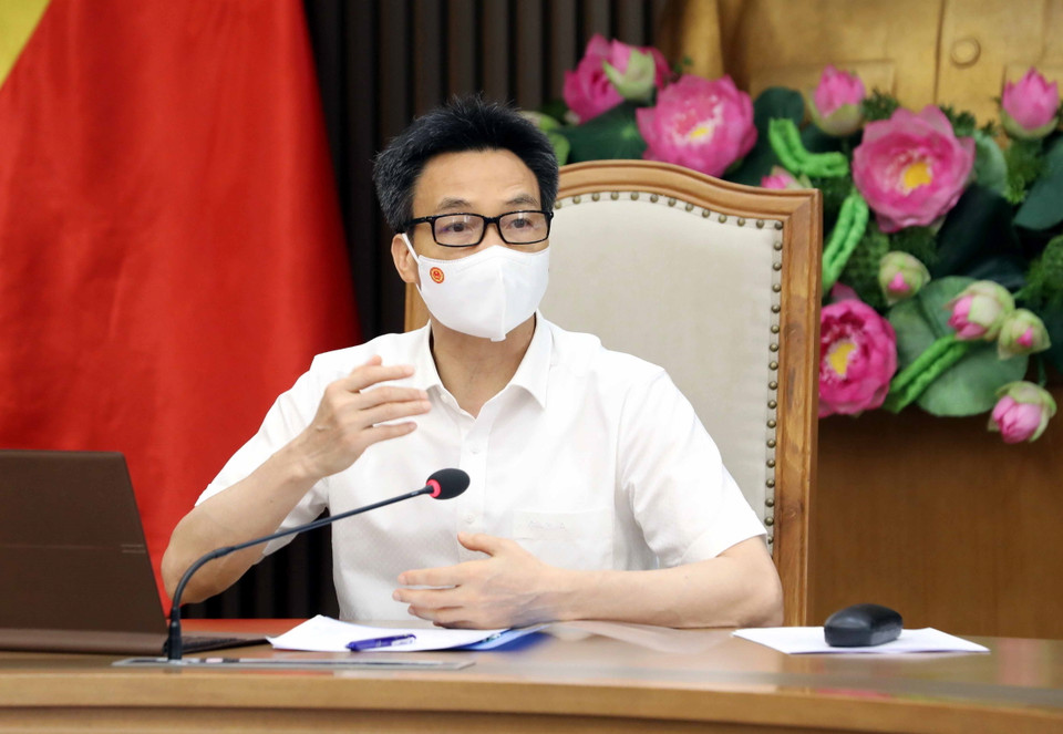 Phó Thủ tướng Chính phủ Vũ Đức Đam, Trưởng Ban Chỉ đạo Quốc gia phòng, chống dịch COVID-19 chủ trì cuộc họp trực tuyến Thường trực Ban Chỉ đạo với lãnh đạo Thành phố Hồ Chí Minh về việc triển khai các biện pháp cấp bách khống chế dịch. (Ảnh: Phạm Kiên/TTXVN)