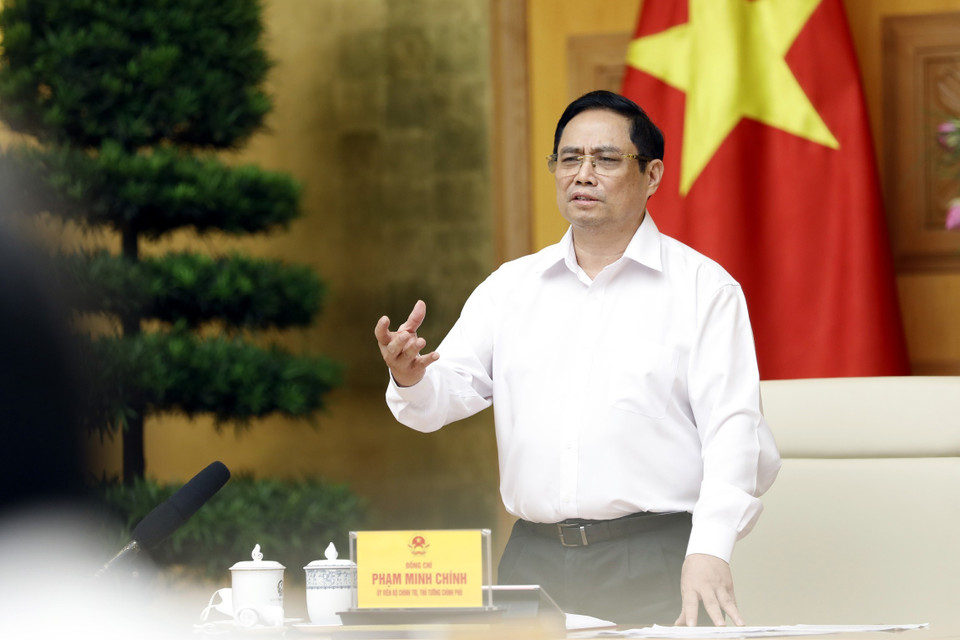 Thủ tướng Phạm Minh Chính nhấn mạnh nhiệm vụ bảo vệ sức khỏe người dân là trước hết, trên hết, phải có đủ vaccine phòng COVID-19 để tiêm cho 75 triệu người dân. (Ảnh: Dương Giang/TTXVN)