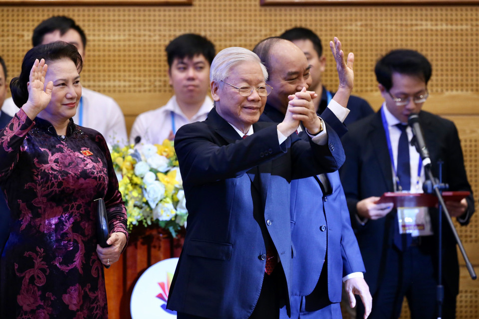 Tổng Bí thư, Chủ tịch nước Nguyễn Phú Trọng, Thủ tướng Nguyễn Xuân Phúc và Chủ tịch Quốc hội Nguyễn Thị Kim Ngân tại Lễ khai mạc. (Ảnh: Dương Giang/TTXVN)