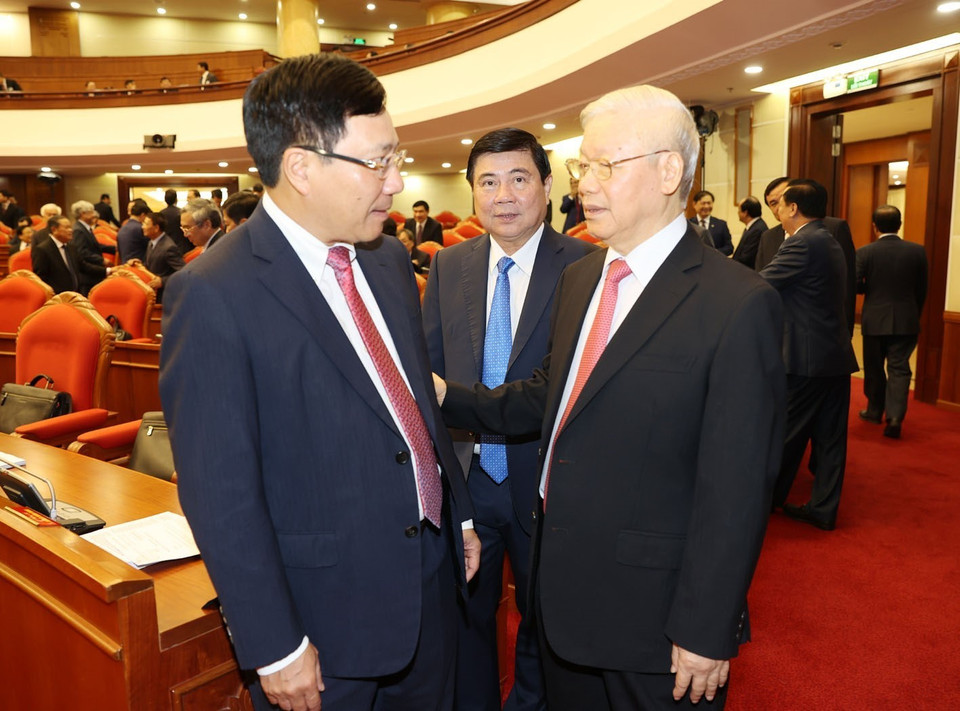 Tổng Bí thư, Chủ tịch nước Nguyễn Phú Trọng với Phó Thủ tướng, Bộ trưởng Ngoại giao Phạm Bình Minh, Chủ tịch UBND Thành phố Hồ Chí Minh Nguyễn Thành Phong tại phiên khai mạc Hội nghị. (Ảnh: Trí Dũng/TTXVN)