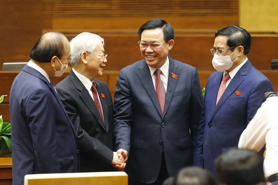 Tổng Bí thư Nguyễn Phú Trọng với Chủ tịch nước Nguyễn Xuân Phúc, Thủ tướng Phạm Minh Chính và Chủ tịch Quốc hội Vương Đình Huệ. (Ảnh: Doãn Tấn/TTXVN)