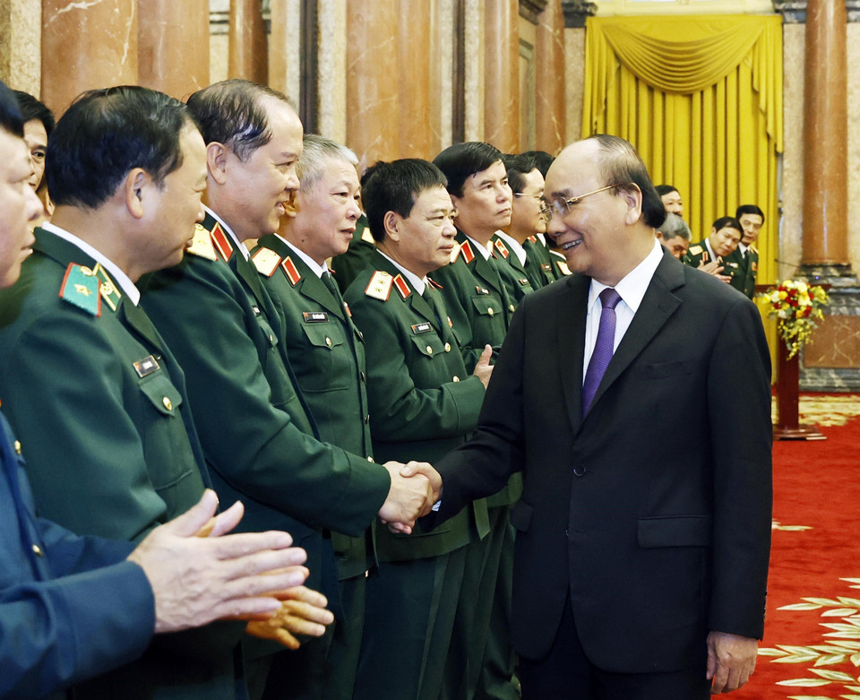 Chủ tịch nước Nguyễn Xuân Phúc và các đại biểu tham dự buổi lễ. (Ảnh: Thống Nhất/TTXVN)