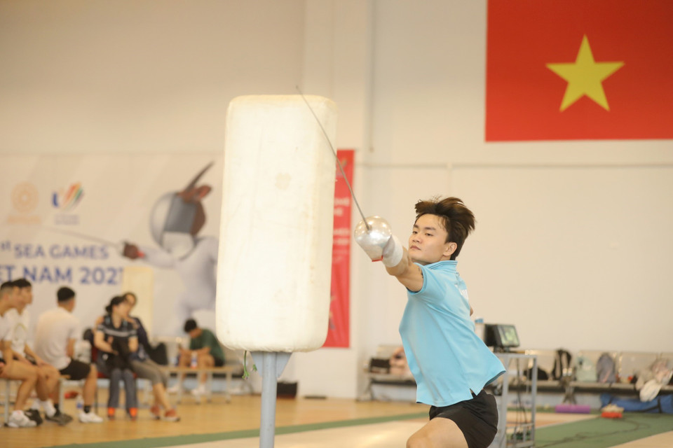 Vận động viên Nguyễn Văn Quyết nỗ lực tập luyện chuẩn bị cho SEA Games 32 sắp tới. (Ảnh: Minh Quyết/TTXVN)