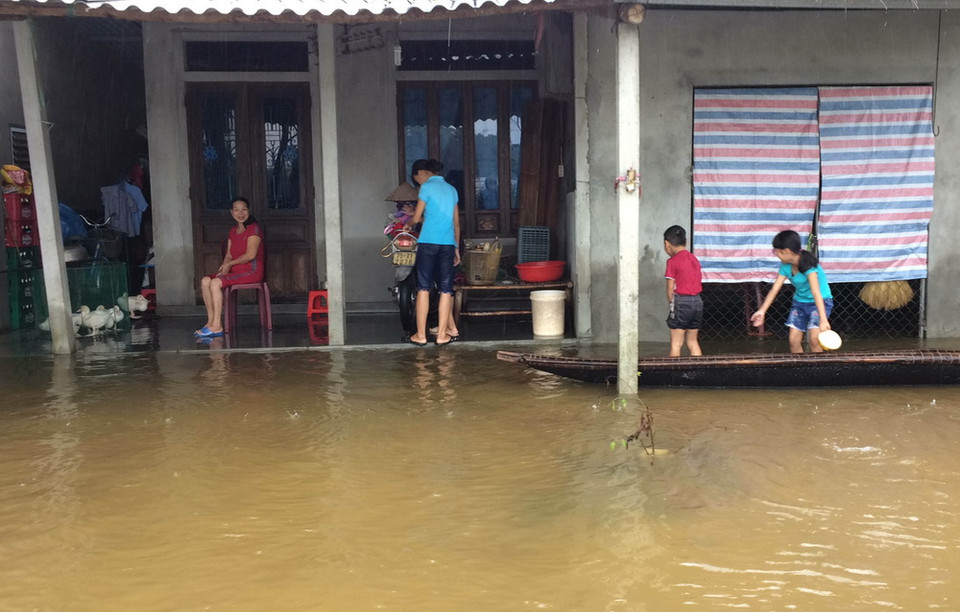 Ngập lụt tại xã Quảng Vinh, huyện Quảng Điền, Thừa Thiên-Huế. (Ảnh: Hồ Cầu/TTXVN)