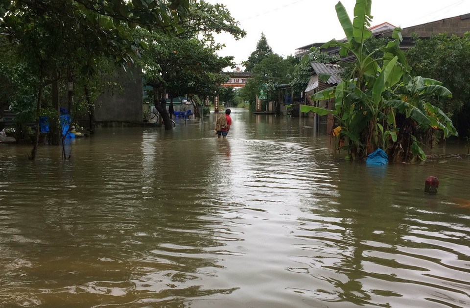 Ngập lụt tại xã Quảng Vinh, huyện Quảng Điền, Thừa Thiên-Huế. (Ảnh: Hồ Cầu/TTXVN)