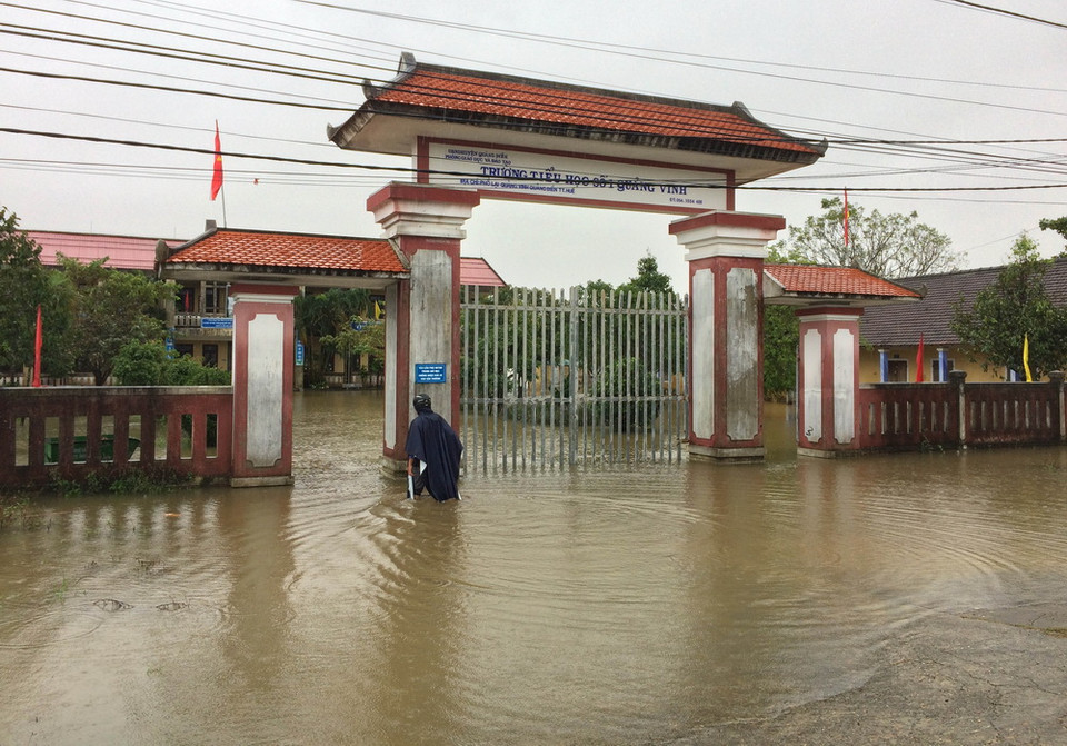 Ngập lụt tại xã Quảng Vinh, huyện Quảng Điền, Thừa Thiên-Huế. (Ảnh: Hồ Cầu/TTXVN)