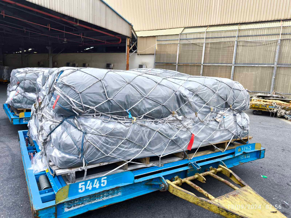 Hãng ưu tiên tải chất xếp hàng để vận chuyển nhanh nhất có thể từ các sân bay miền Nam, miền Trung ra Bắc, kịp thời đến được đồng bào vùng lũ lụt bị ảnh hưởng. (Ảnh: PV/Vietnam+)